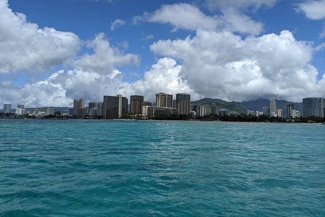 12pm Turtle Canyon Snorkel Adventure - The sailing part after snorkeling: Diamond Head and Waikiki from a catamaran