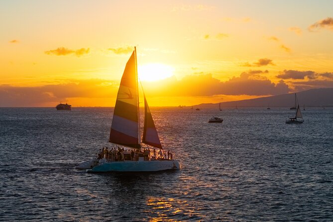 Board from Waikiki Beach for a scenic Sunset Sail on the Hāwea - Barefoot Boarding and Ladder Steps: The Main Reality Check