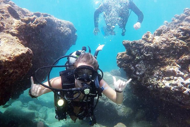 First-Time Scuba Diving in Honolulu + Free Videos - Honolulu scuba setup at Magic Island Lagoon: gear, wetsuit, and that first breath