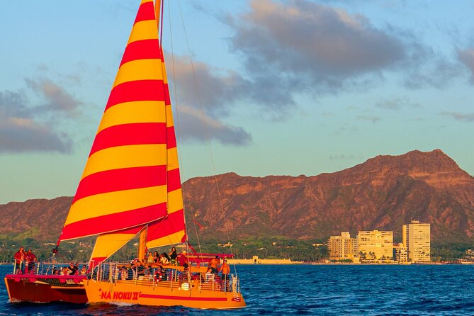 Honolulu Sunset Sail from Kewalo Harbor Including Drinks - Drinks and music: included, but aim your expectations