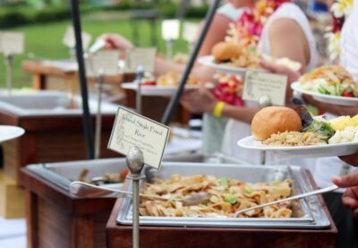 Oahu: Queens Waikiki Luau - Getting in the mood: cultural activities, lei moments, and hula time
