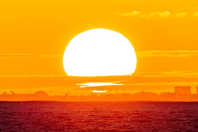 Oahu's Waikiki Coast: Moana’s Sunset Cocktail Sail - Photos: Diamond Head silhouettes are the main event