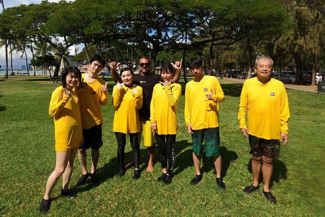 Open Group Surfing Lesson in Waikiki, Hawaii - Coaching in the water: paddling, turning, standing, and avoiding trouble