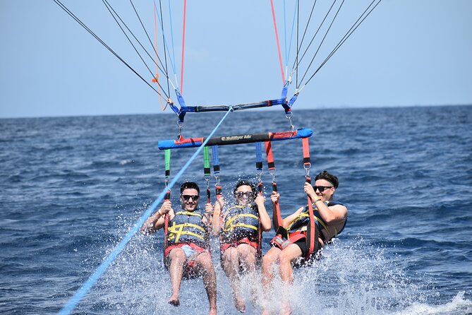 Parasailing in Waikiki from Oahu Hawaii - Photos and the optional splash: fun add-ons, real decisions